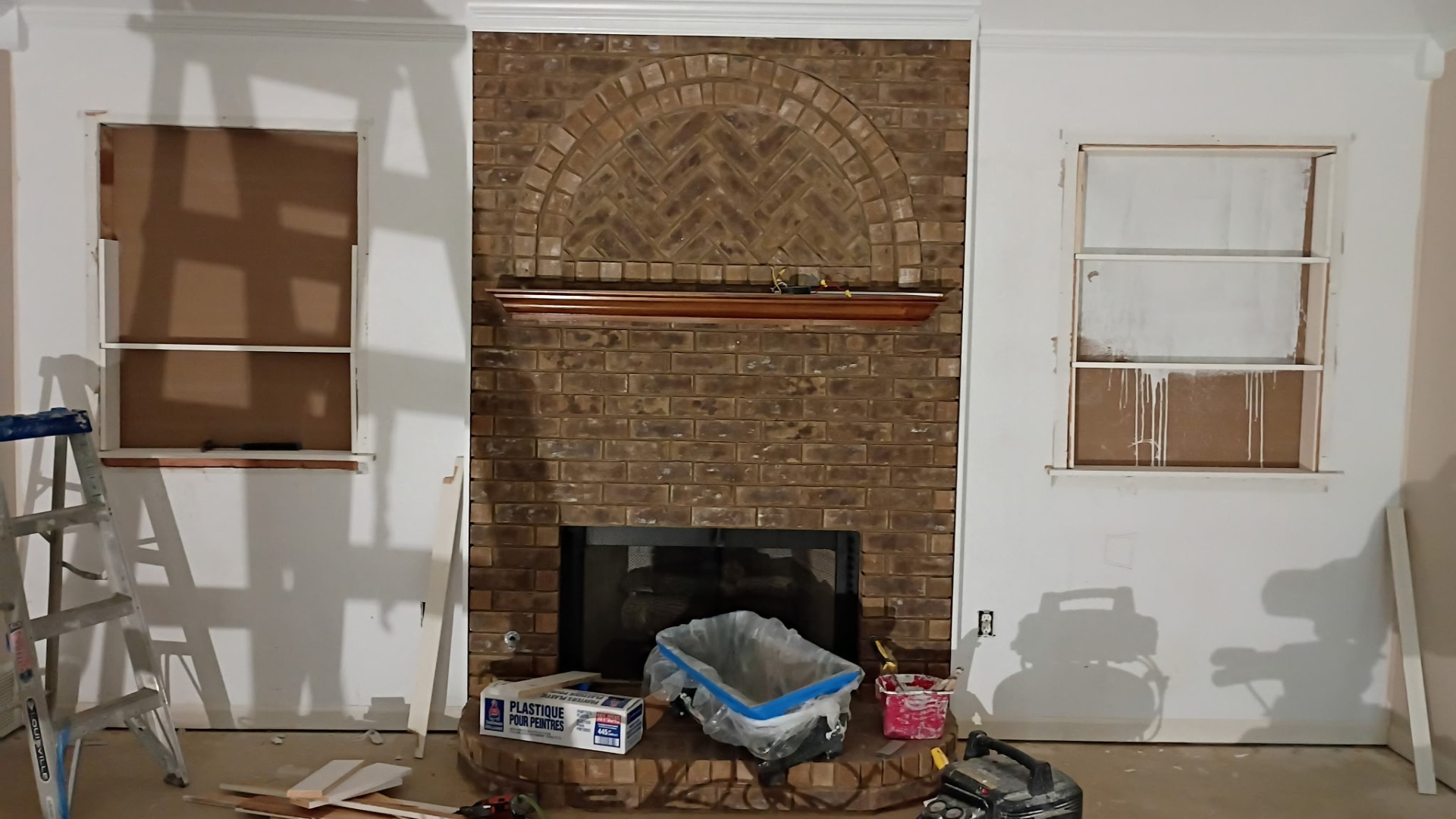 Living room fireplace and drywall prep by Lopez Drywall