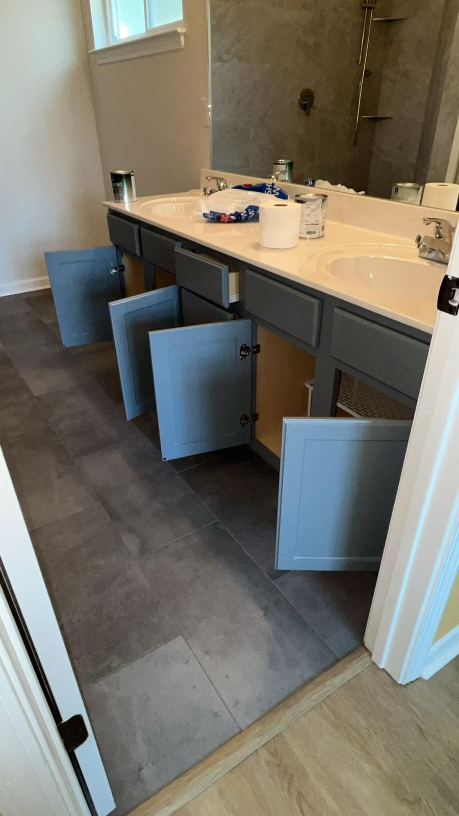 Bathroom vanity after refinishing by Lopez Drywall